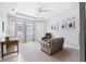 Bright living room with neutral tones, a desk, comfortable seating, and lots of natural light at 537 Ocean Spray Dr, Ruskin, FL 33570