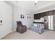 Cozy living room with a mini-kitchen, comfortable seating, and a relaxing atmosphere at 537 Ocean Spray Dr, Ruskin, FL 33570