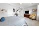 Comfortable bedroom with decor, soft lighting, and carpet flooring at 537 Ocean Spray Dr, Ruskin, FL 33570