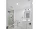 Modern bathroom featuring a glass-enclosed shower, updated fixtures, and a sleek vanity at 5614 Bay Boulevard, Port Richey, FL 34668