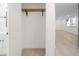 Empty closet space adjacent to bathroom and large living area at 5614 Bay Boulevard, Port Richey, FL 34668