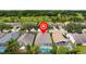 This beautiful home features a sparkling screened-in pool with lovely golf course views at 5628 Terrain De Golf Dr, Lutz, FL 33558