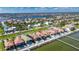 Aerial view of homes with backyard pools and waterfront access at 6418 Bright Bay Ct, Apollo Beach, FL 33572