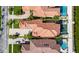 A high-angle aerial view of a terracotta-roofed property with a sparkling pool at 6418 Bright Bay Ct, Apollo Beach, FL 33572
