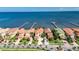 Aerial view of waterfront homes featuring private docks on a sunny day at 6418 Bright Bay Ct, Apollo Beach, FL 33572
