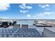 Back patio with comfortable seating and jacuzzi overlooking peaceful waterfront views for outdoor enjoyment at 6418 Bright Bay Ct, Apollo Beach, FL 33572