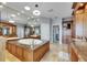 Spacious bathroom featuring a large soaking tub with granite surround and custom wood cabinetry at 6418 Bright Bay Ct, Apollo Beach, FL 33572