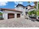 Beautiful home exterior featuring a paver driveway, two-car garage and decorative architectural features at 6418 Bright Bay Ct, Apollo Beach, FL 33572