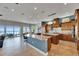 Gourmet kitchen features a large island, custom cabinetry, and stunning waterfront views at 6418 Bright Bay Ct, Apollo Beach, FL 33572