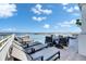 Inviting pool area with plenty of lounge seating and an ocean view, perfect for relaxation at 6418 Bright Bay Ct, Apollo Beach, FL 33572