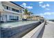 Beautiful backyard with a luxurious pool and spa, perfect for relaxation and entertaining by the waterfront at 6418 Bright Bay Ct, Apollo Beach, FL 33572