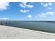 Water view featuring an extended pier and blue skies at 6418 Bright Bay Ct, Apollo Beach, FL 33572