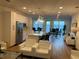 Spacious amenity space with modern kitchen, comfortable seating, and stylish lighting at 644 3Rd S Ave # 402, St Petersburg, FL 33701