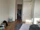 Bedroom with wood floors and neutral paint at 644 3Rd S Ave # 402, St Petersburg, FL 33701