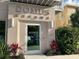 Entrance to building with 'Domus Urbana' signage, door, and decorative greenery at 644 3Rd S Ave # 402, St Petersburg, FL 33701