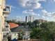 City view showing the surrounding buildings and trees from the balcony at 644 3Rd S Ave # 402, St Petersburg, FL 33701