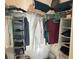 Walk-in closet with plentiful clothes hanging, shelving, and storage for organization at 644 3Rd S Ave # 402, St Petersburg, FL 33701