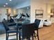 Fitness center with treadmills, mirrored wall, lounge seating and hardwood floors at 644 3Rd S Ave # 402, St Petersburg, FL 33701