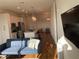 Open floor plan with living room and kitchen and hardwood floors at 644 3Rd S Ave # 402, St Petersburg, FL 33701