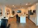 Bright and spacious living room connected to a modern kitchen with an island at 644 3Rd S Ave # 402, St Petersburg, FL 33701