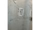 Modern shower stall featuring marble-style tiles and a glass enclosure at 644 3Rd S Ave # 402, St Petersburg, FL 33701