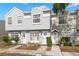 Charming townhome featuring well-maintained landscaping, and reserved parking out front at 6681 121St Ave # I, Largo, FL 33773