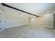 Expansive living area featuring tile flooring, neutral paint, and access to multiple rooms at 7332 Janczlik Dr, New Port Richey, FL 34652