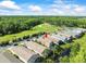 Features an aerial view of the home located on a golf course at 7606 Berna Ln, Land O Lakes, FL 34637