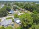 Spacious property featuring a neatly landscaped yard, captured from an aerial perspective at 7704 Tanglewood Ln, Tampa, FL 33615