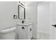 Modern bathroom features sleek black fixtures and stylish vanity at 7704 Tanglewood Ln, Tampa, FL 33615