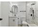 Modern bathroom features marble shower, sleek black fixtures, and stylish vanity at 7704 Tanglewood Ln, Tampa, FL 33615