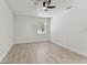 Bright bedroom with a modern ceiling fan and natural light from the window at 7704 Tanglewood Ln, Tampa, FL 33615