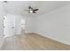 Spacious bedroom featuring doorway to the main bathroom at 7704 Tanglewood Ln, Tampa, FL 33615