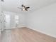 Bedroom with door to bathroom and door to walk-in closet at 7704 Tanglewood Ln, Tampa, FL 33615