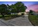 Charming single-story home with a spacious front yard and long driveway at 7704 Tanglewood Ln, Tampa, FL 33615