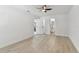 Spacious main bedroom featuring doorways to the kitchen and main bathroom at 7704 Tanglewood Ln, Tampa, FL 33615