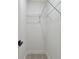Walk-in closet featuring wire rack shelving and ample vertical storage at 7704 Tanglewood Ln, Tampa, FL 33615