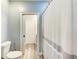 Bathroom with a toilet and a walk-in shower at 7803 Mathern Ct, Lakewood Ranch, FL 34202