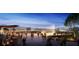 A commercial space featuring an open courtyard, modern glass buildings, and an inviting outdoor plaza at 7803 Mathern Ct, Lakewood Ranch, FL 34202