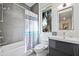 Modern bathroom features a sleek vanity, tiled shower, and stylish design at 827 Placido Ne Way, St Petersburg, FL 33704