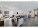 Comfortable living space featuring sleek tile flooring, stylish furniture, and abundant natural light at 827 Placido Ne Way, St Petersburg, FL 33704