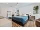 Bright bedroom with plush bed, decorative rug, and ample natural light at 827 Placido Ne Way, St Petersburg, FL 33704