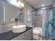 Bathroom featuring a modern vanity, stylish fixtures, and a shower with tiled walls at 8289 136Th St, Seminole, FL 33776