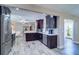 View of the updated kitchen features stainless steel appliances, modern fixtures, and neutral countertops at 8289 136Th St, Seminole, FL 33776