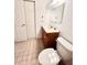 Bathroom featuring tile flooring, single sink vanity, and standard toilet at 9481 Highland Oak Dr # 1101, Tampa, FL 33647