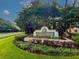 Landscaped entrance sign for The Highlands, highlighting the community's manicured appearance at 9481 Highland Oak Dr # 1101, Tampa, FL 33647