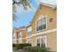Inviting condo building featuring classic architecture and serene landscaping at 9481 Highland Oak Dr # 1101, Tampa, FL 33647