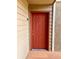Exterior shot of a red front door at 9481 Highland Oak Dr # 1101, Tampa, FL 33647