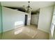 Bright dining area featuring tile floors, neutral walls, and large windows for natural light at 9614 Long Meadow Dr, Tampa, FL 33615