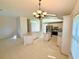 Bright and spacious kitchen with tile flooring, a center island, modern appliances and ample counter space at 9614 Long Meadow Dr, Tampa, FL 33615